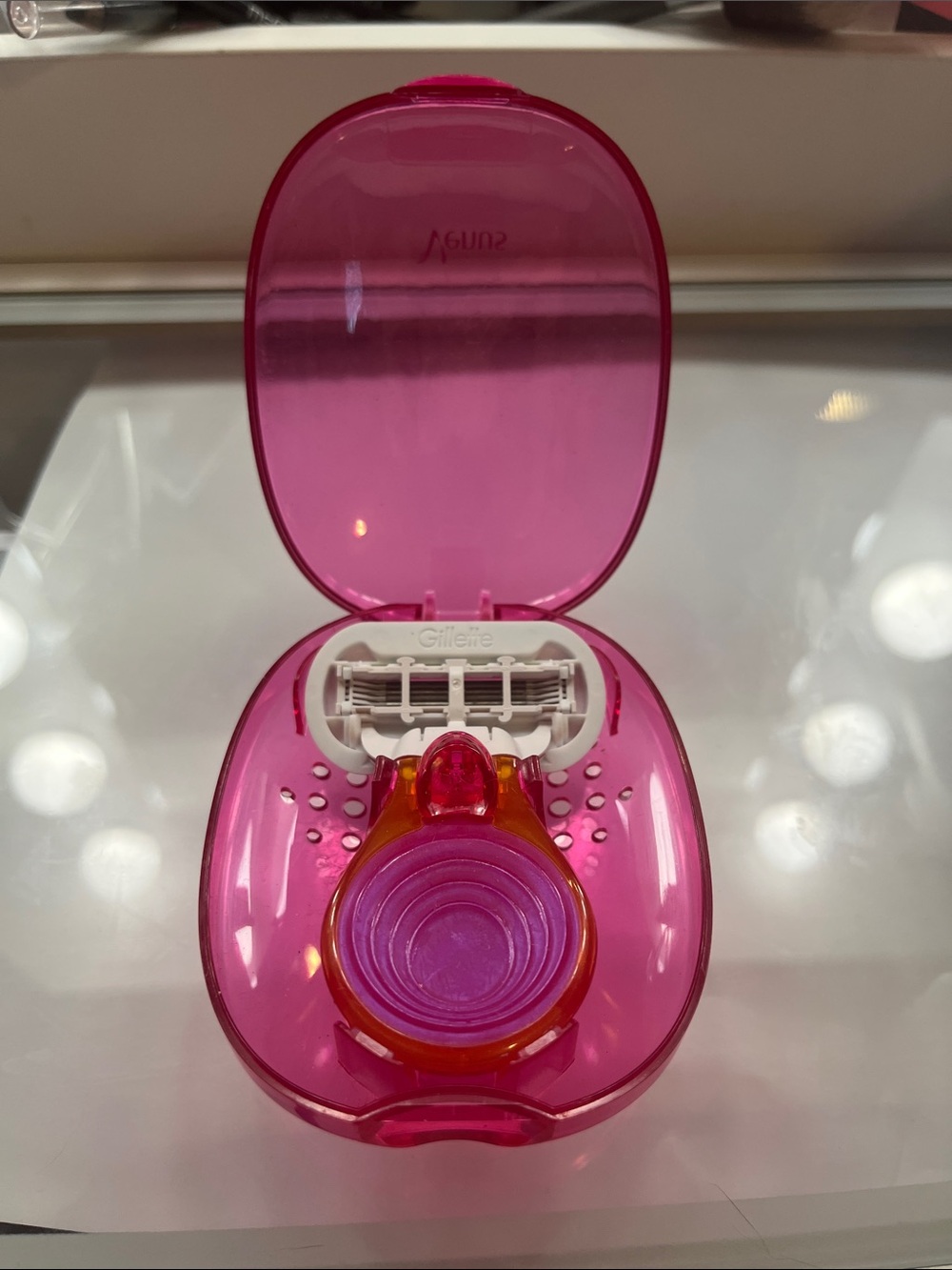 Mini Pink and Orange Compact Razor with Pink Translucent Cartridge Holder